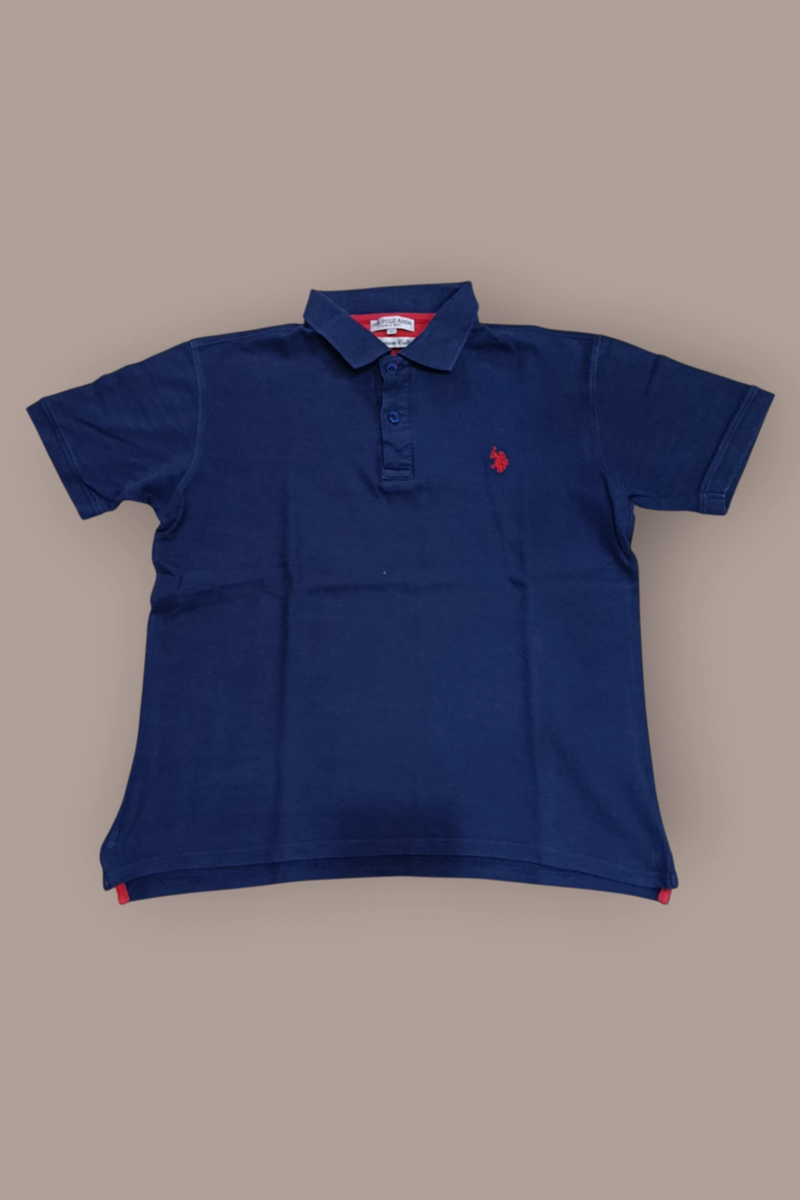 | Polo U.S. Polo Assn. Hombre | Color Azul Marino | Logo Bordado Rojo | Manga Corta | Talla L |